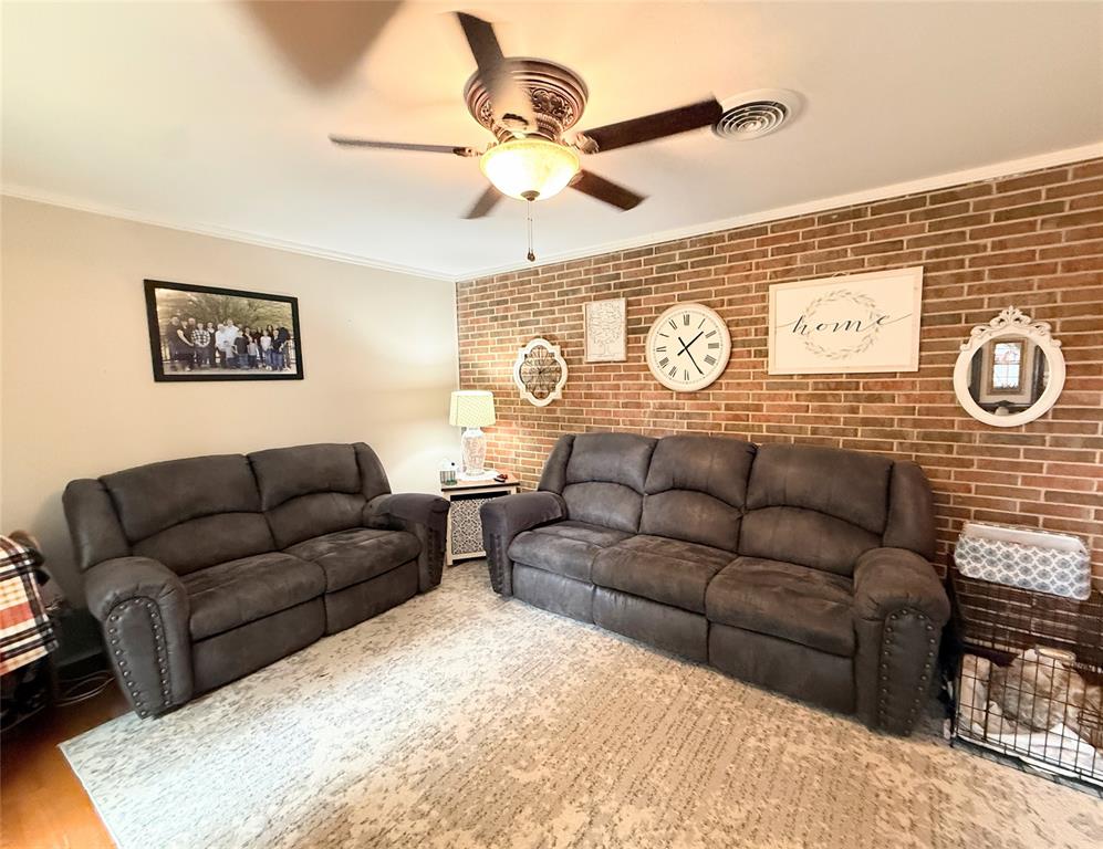 112 Meadow Lane Groesbeck, TX 76642 - Photo 5 of 37 a living room with furniture and a window