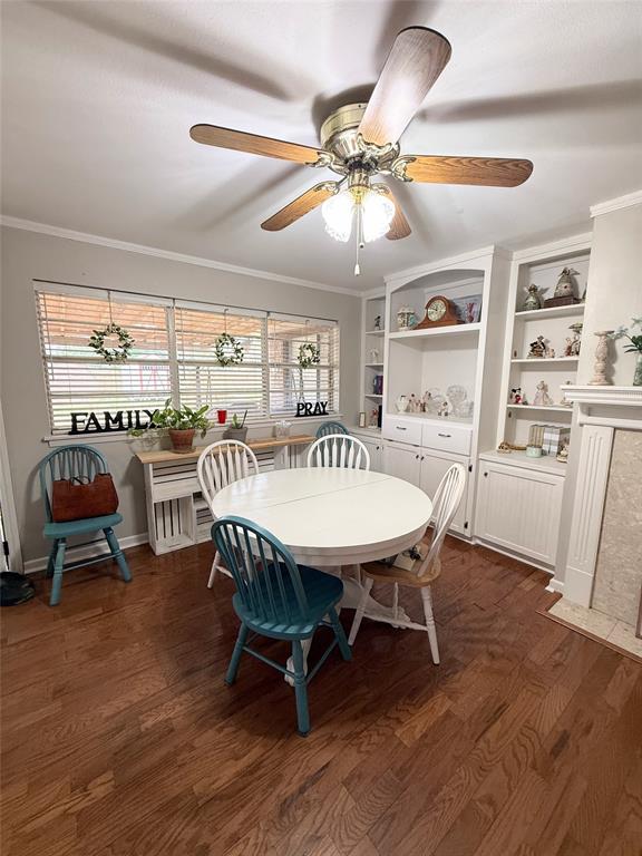 112 Meadow Lane Groesbeck, TX 76642 - Photo 10 of 37 a view of a dining room with furniture window and wooden floor