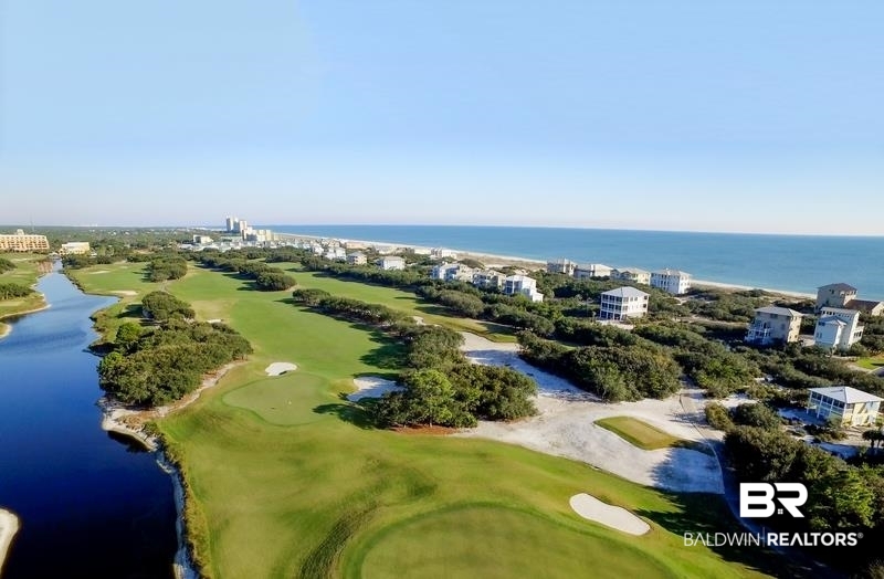 815 Plantation Road, Unit 405 Gulf Shores, AL 36542 - Photo 33 of 39 Birds eye view of property with a water view