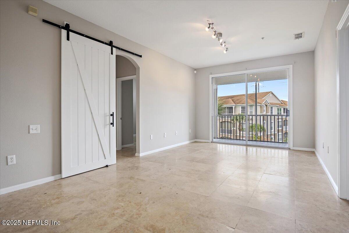 10550 Baymeadows Road, Unit 1028 Jacksonville, FL 32256 - Photo 6 of 22 05-Dining & Living Room