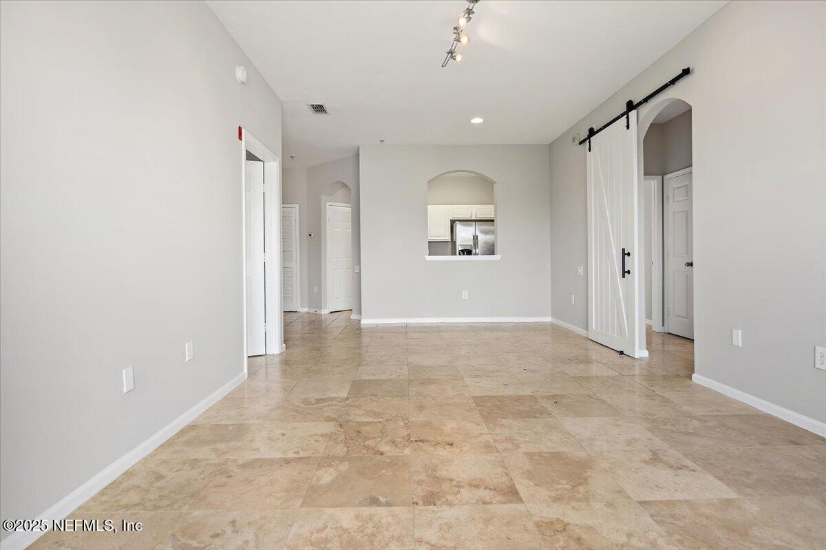 10550 Baymeadows Road, Unit 1028 Jacksonville, FL 32256 - Photo 7 of 22 06-Living & Dining Room