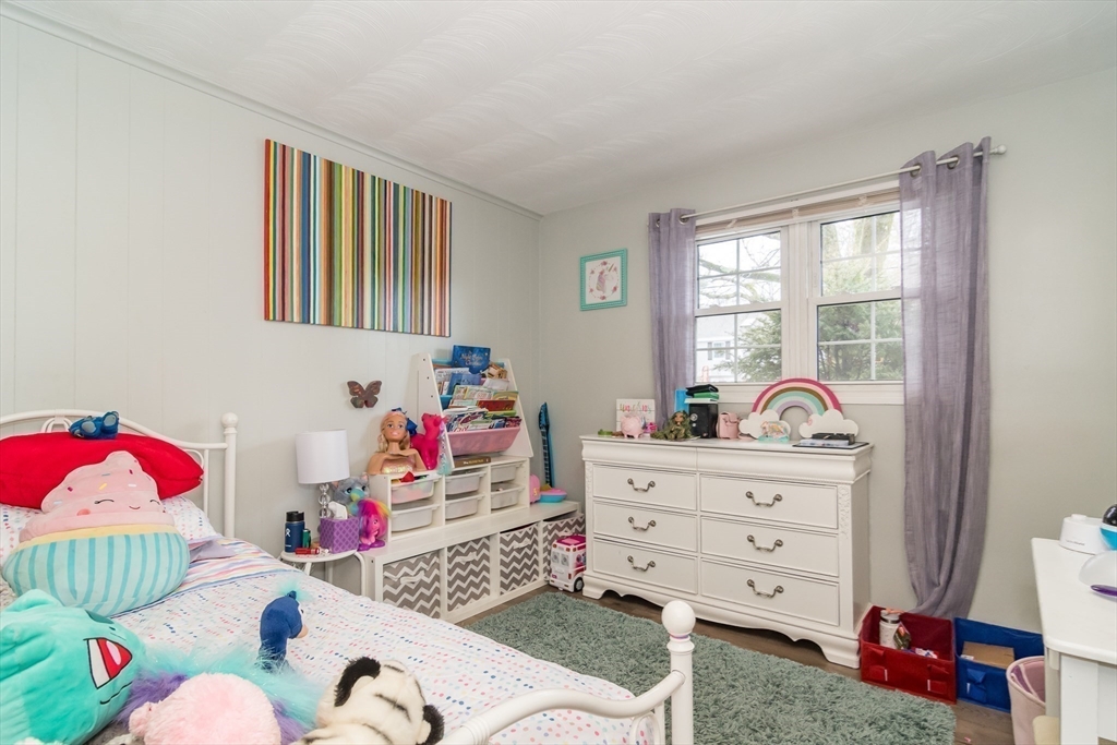 17 Francine Road Framingham, MA 01701 - Photo 11 of 14 a bedroom with a bed and a window
