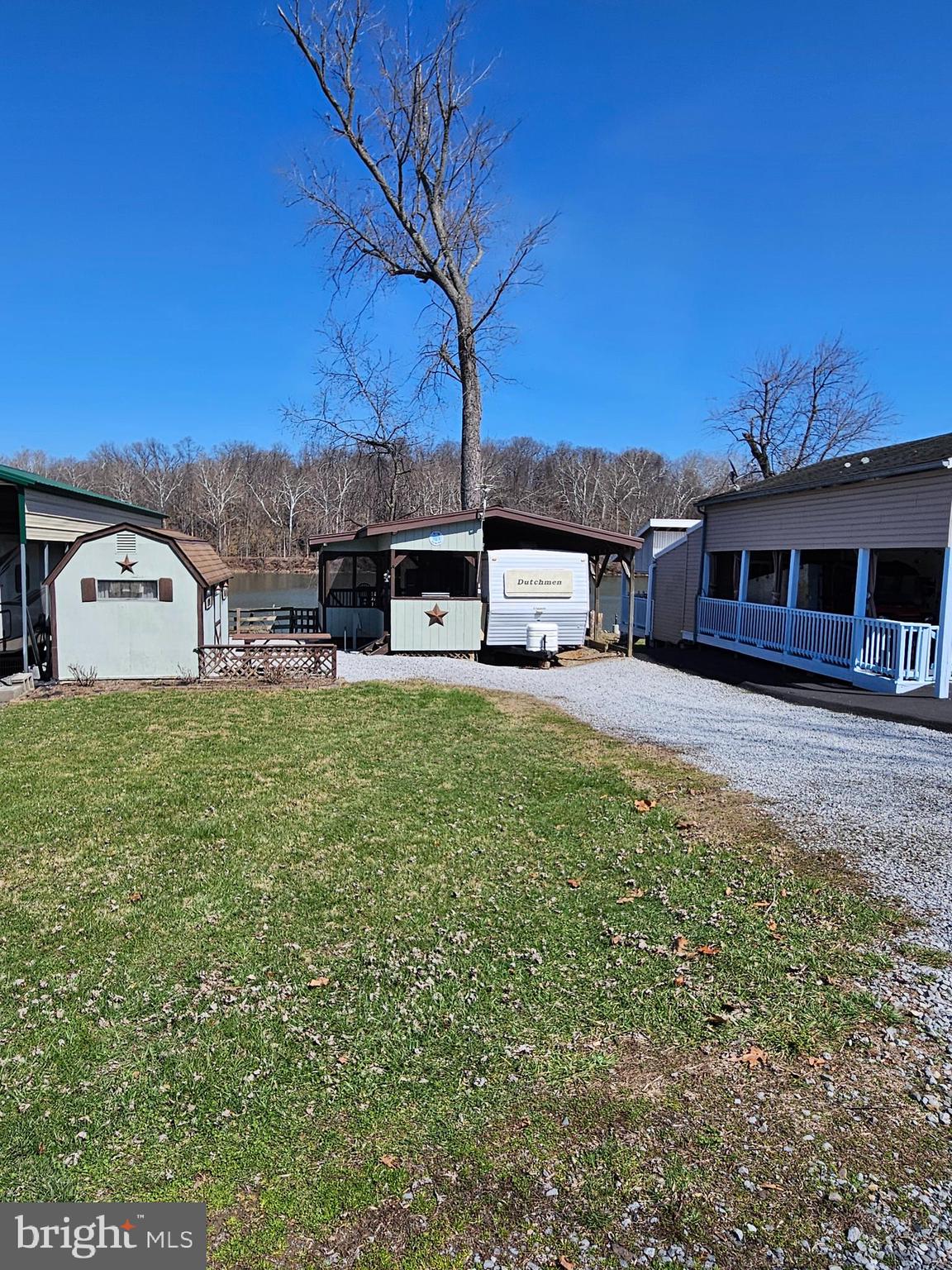 a view of a house with a big yard