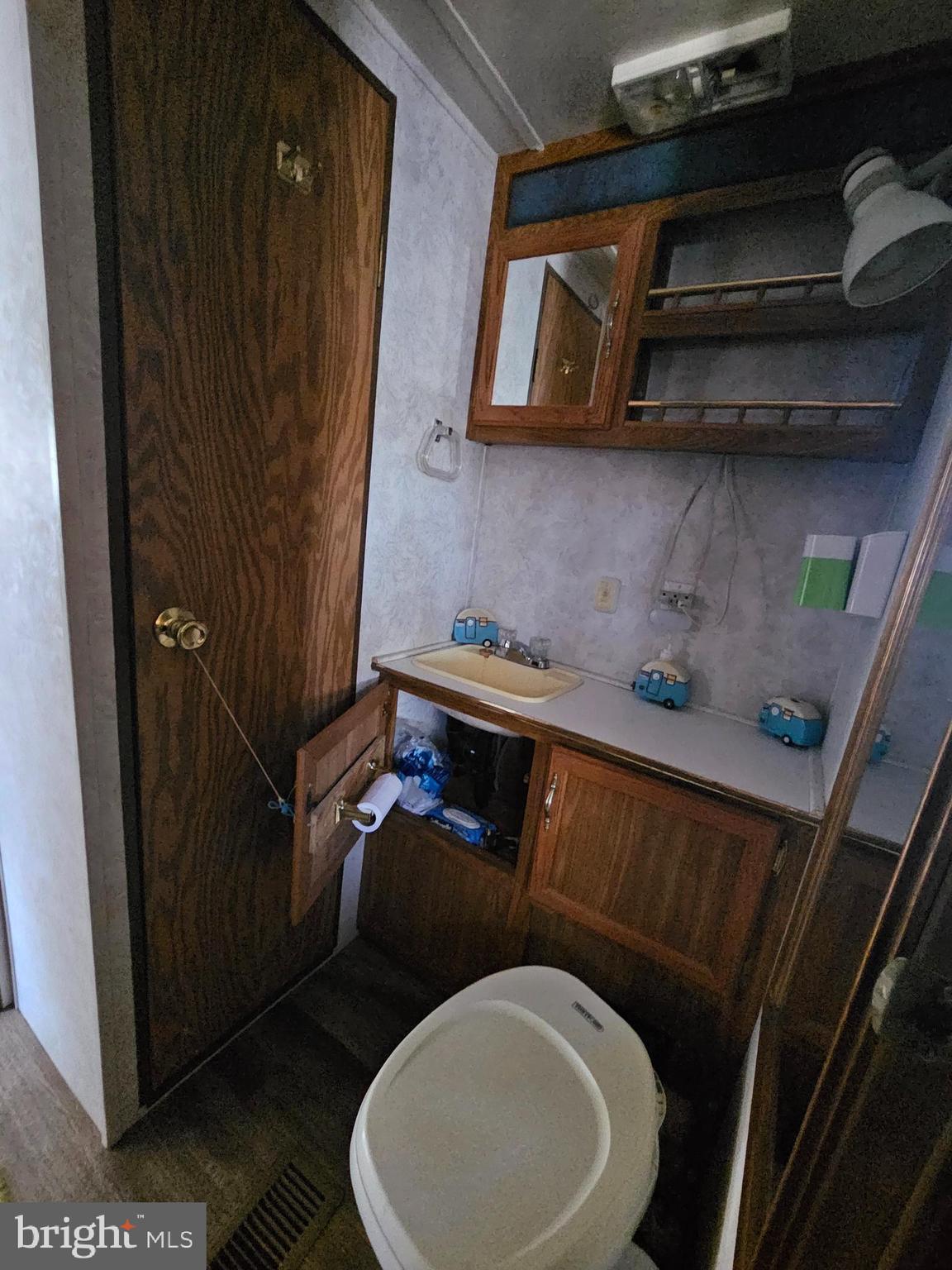 6 Boo Boo Boulevard Falling Waters, WV 25419 - Photo 11 of 19 a bathroom with a toilet and a sink