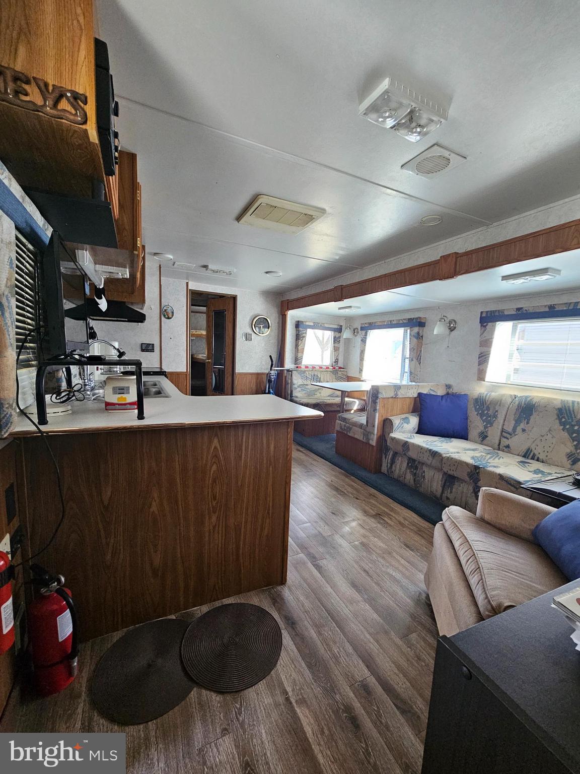 6 Boo Boo Boulevard Falling Waters, WV 25419 - Photo 6 of 19 a living room with furniture and a flat screen tv