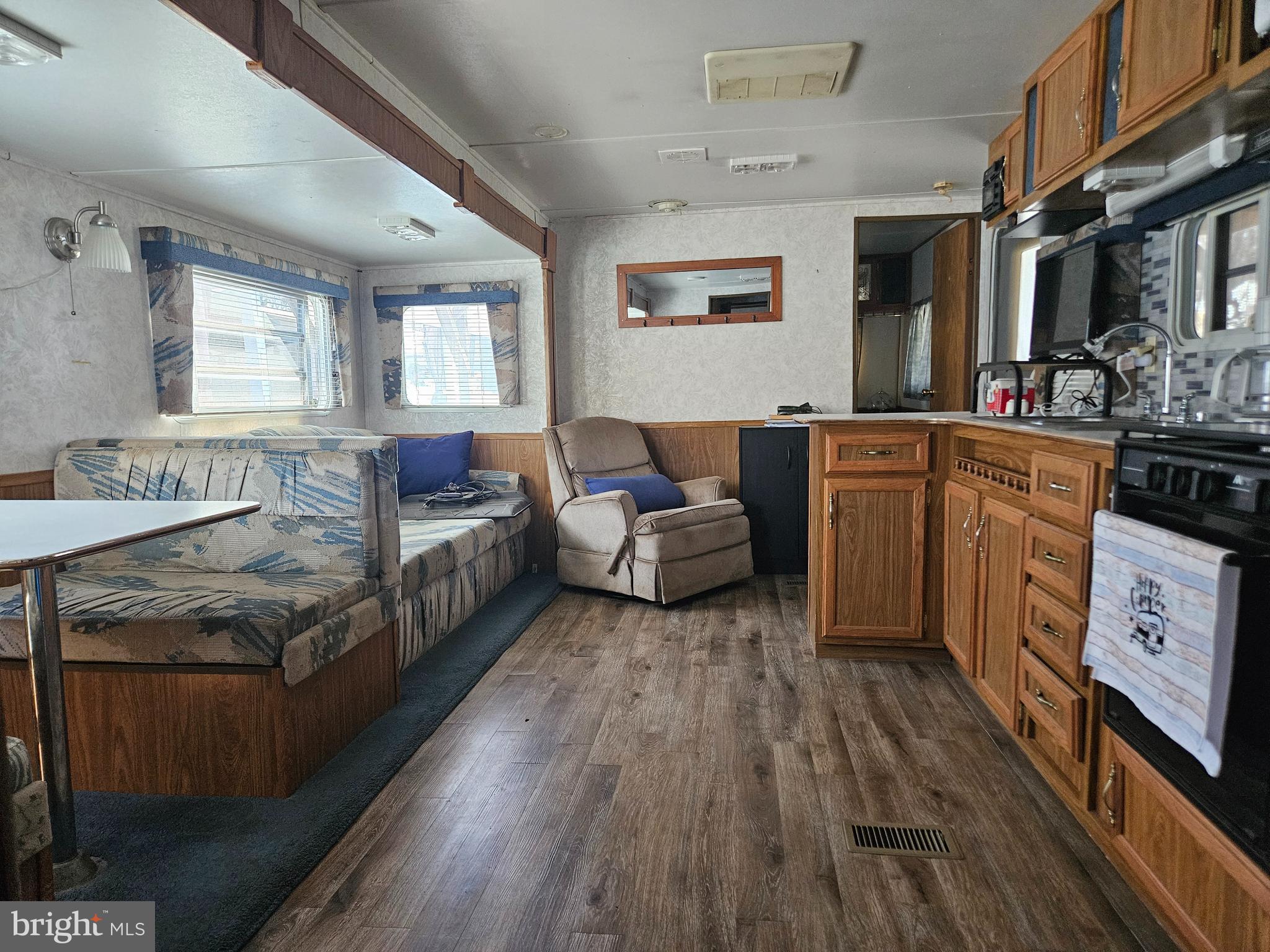 6 Boo Boo Boulevard Falling Waters, WV 25419 - Photo 7 of 19 a spacious bedroom with a bed and a flat tv screen on dresser