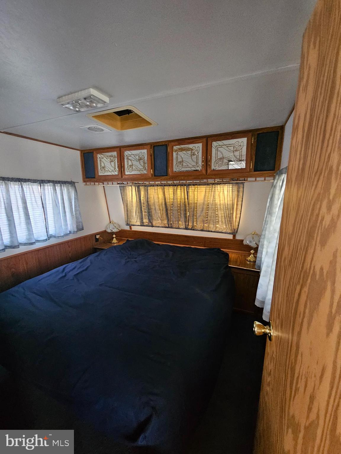 6 Boo Boo Boulevard Falling Waters, WV 25419 - Photo 9 of 19 a view of an empty room with wooden floor and a window