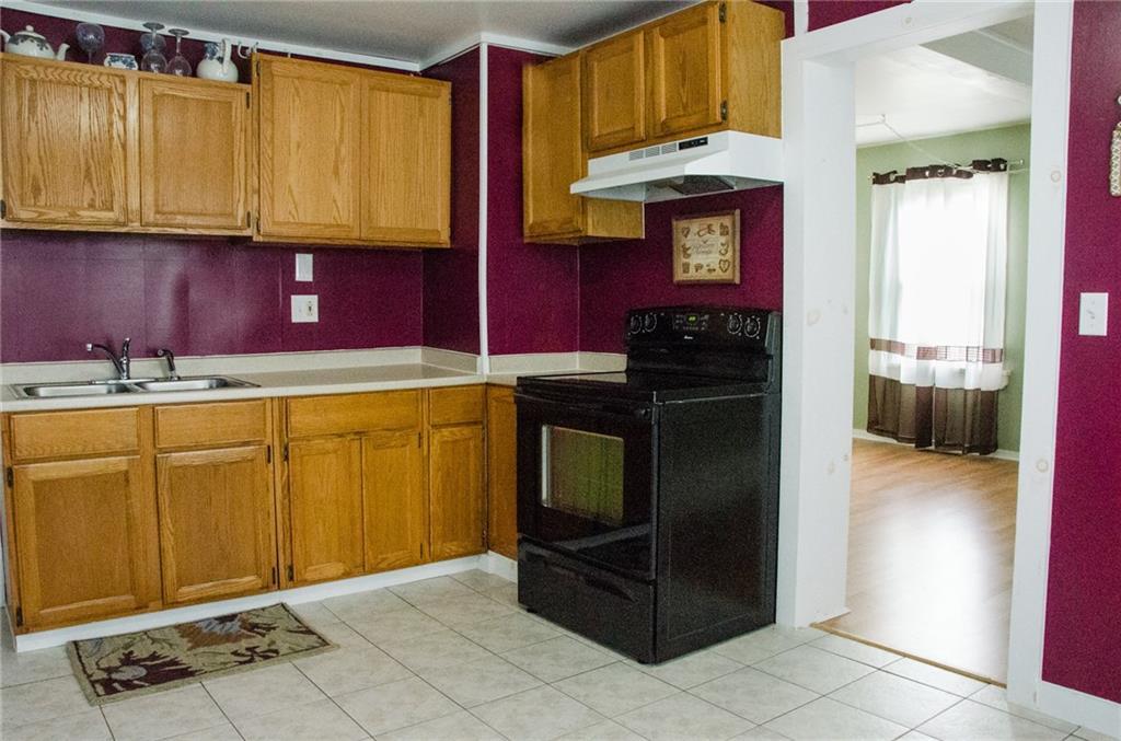 56 Kinderhook Street Randolph, ME 04346 - Photo 11 of 27 Kitchen view with newer stove and...