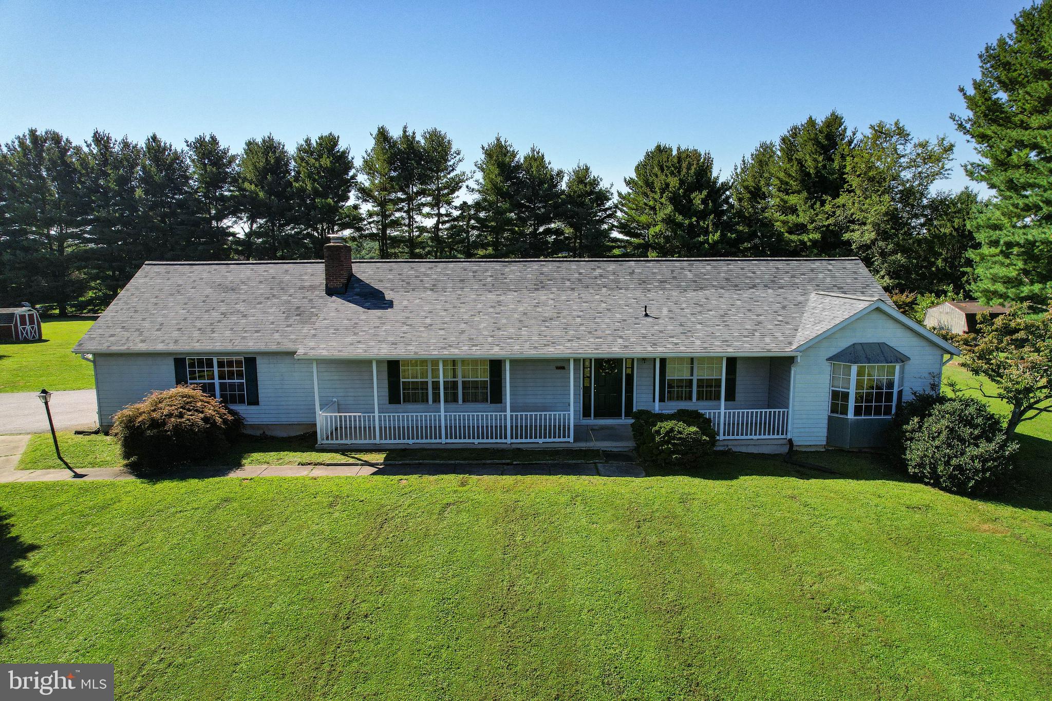 4709 Mt Carmel Road Hampstead, MD 21074 - Photo 35 of 44 a front view of a house with a yard and garage