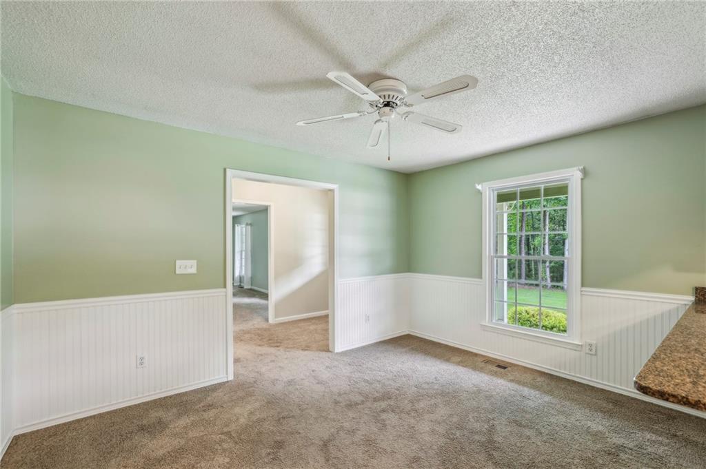 4645 Shallowford Road Roswell, GA 30075 - Photo 14 of 34 a view of an empty room with a window