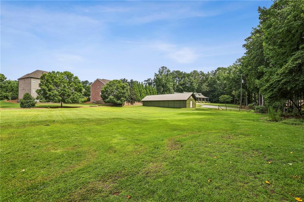 4645 Shallowford Road Roswell, GA 30075 - Photo 26 of 34 a view of a green field