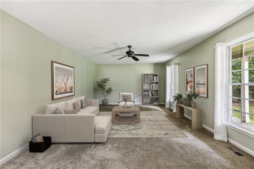 4645 Shallowford Road Roswell, GA 30075 - Photo 3 of 34 a living room with furniture and a large window