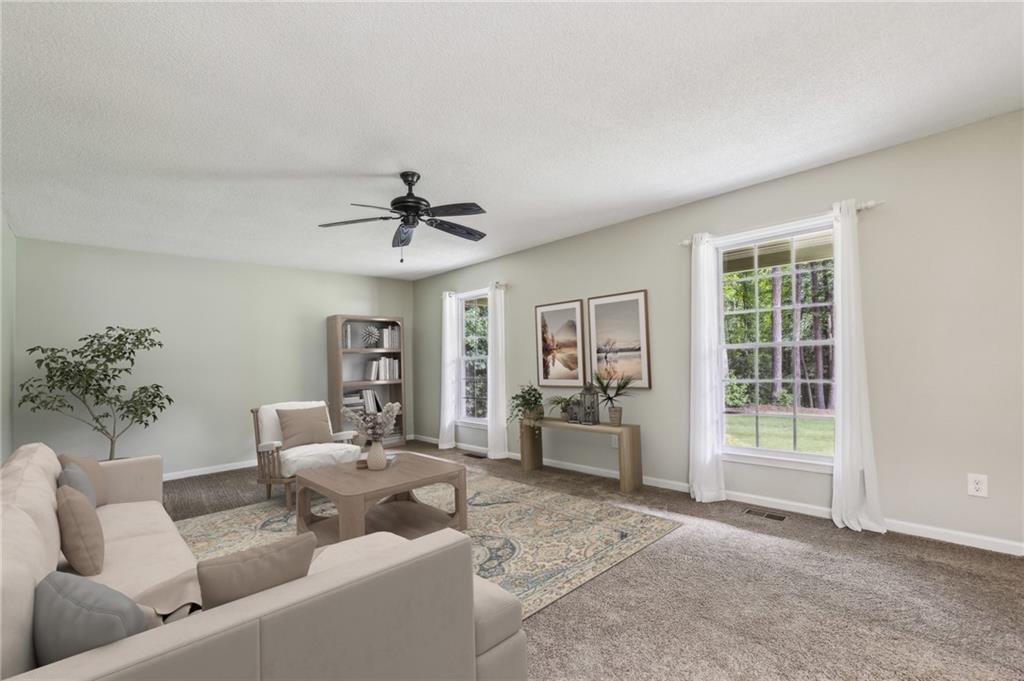 4645 Shallowford Road Roswell, GA 30075 - Photo 5 of 34 a living room with furniture and a window