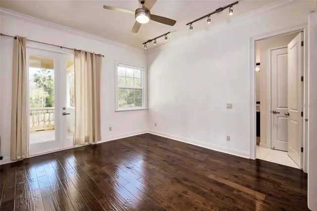 a bedroom with a bed and a chair