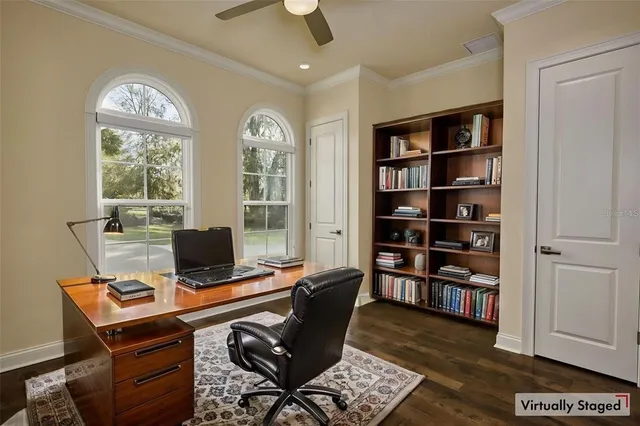 a white toilet and tub sitting next to a bathroom sink