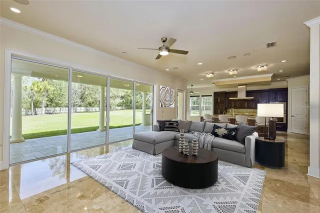 a kitchen with stainless steel appliances granite countertop a sink and a stove