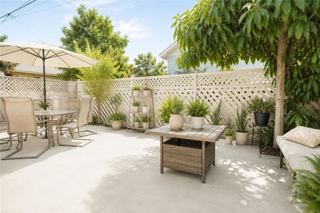 2030 Wayside Street Compton, CA 90222 - Photo 11 of 25 This image has been digitally enhanced to illustrate the patio's potential with minor upgrades.