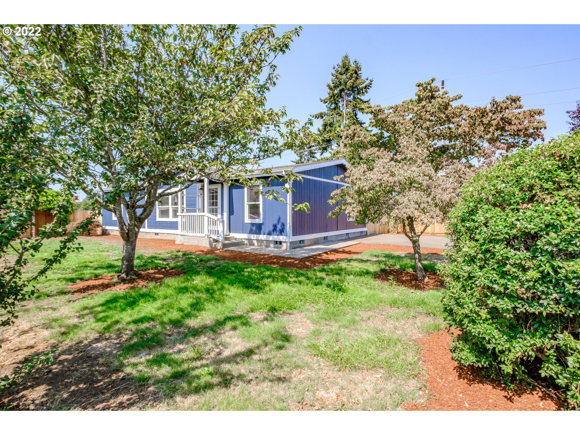 833 Northridge Avenue Springfield, OR 97477 - Photo 2 of 31 a view of a house with backyard and sitting area