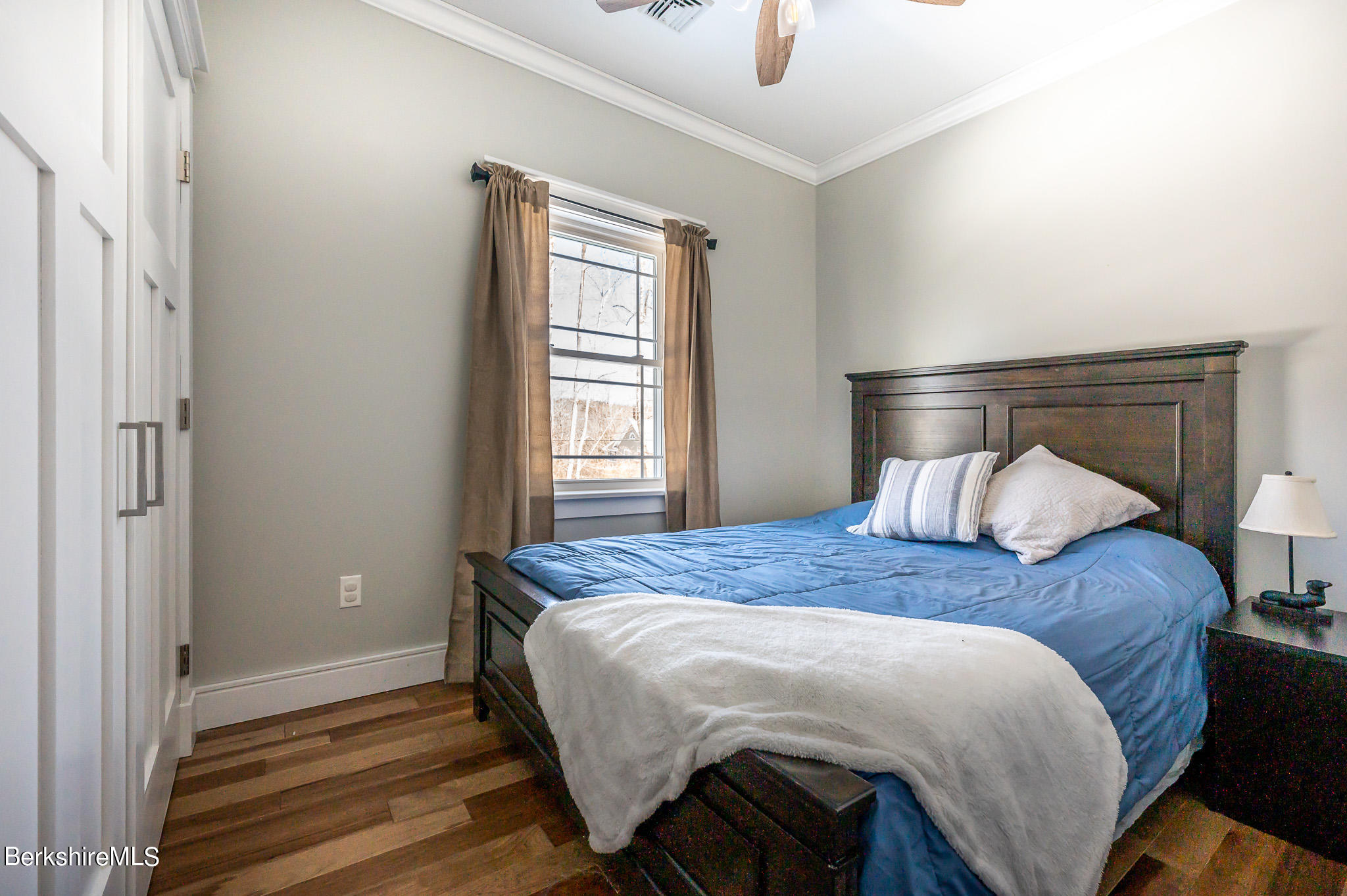 3 Chestnut Hill Road Monterey, MA 01245 - Photo 12 of 26 a bedroom with a bed and a window