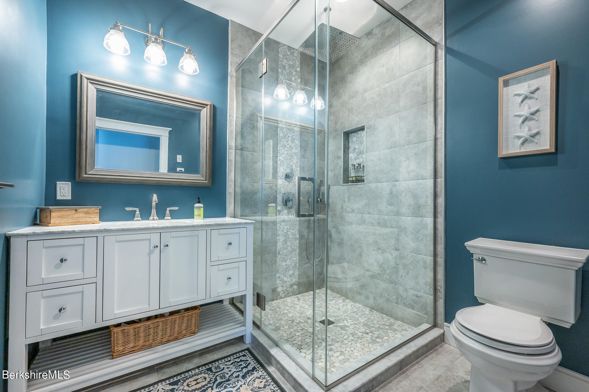 3 Chestnut Hill Road Monterey, MA 01245 - Photo 13 of 26 a bathroom with a toilet a sink a mirror and shower