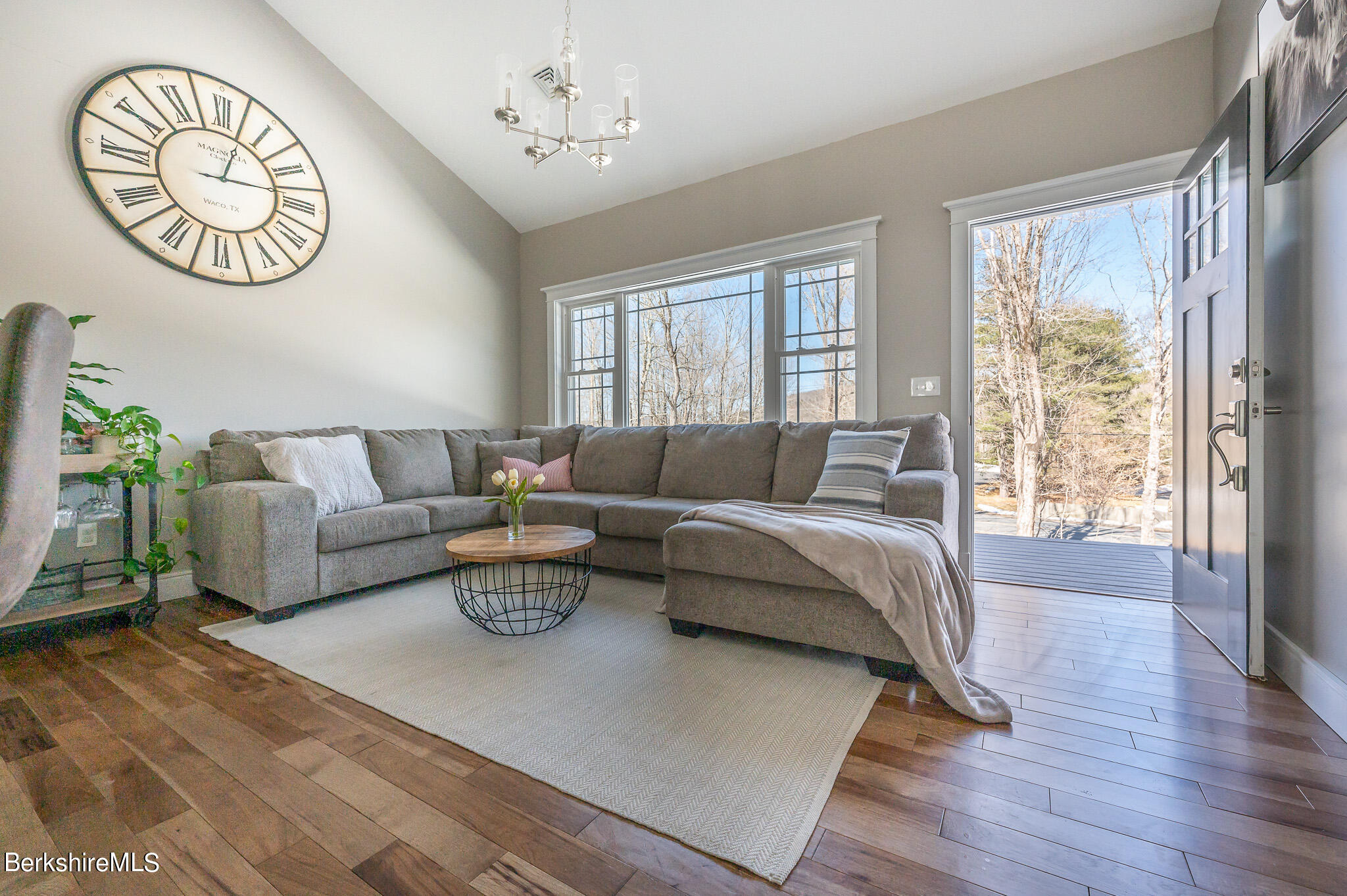 3 Chestnut Hill Road Monterey, MA 01245 - Photo 18 of 26 a living room with furniture and a large window