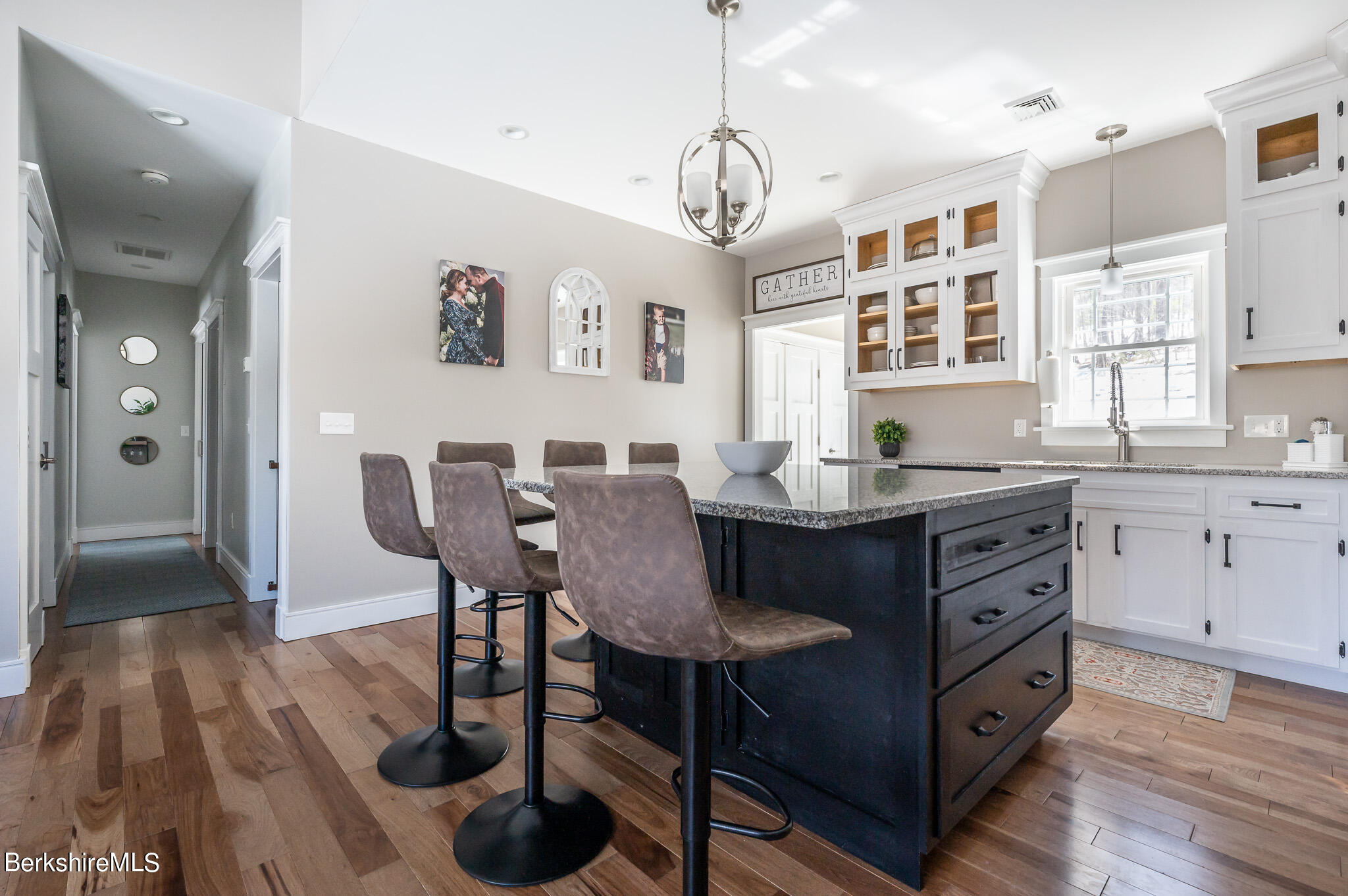 3 Chestnut Hill Road Monterey, MA 01245 - Photo 7 of 26 a view of dining room and kitchen with a table chairs