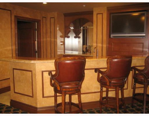 2 Renaissance Way, Unit 2320 Boynton Beach, FL 33426 - Photo 6 of 8 a couple of chairs sitting in front of a door