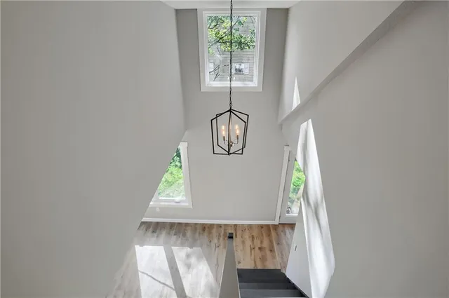 a close view of kitchen island with wooden floor and window