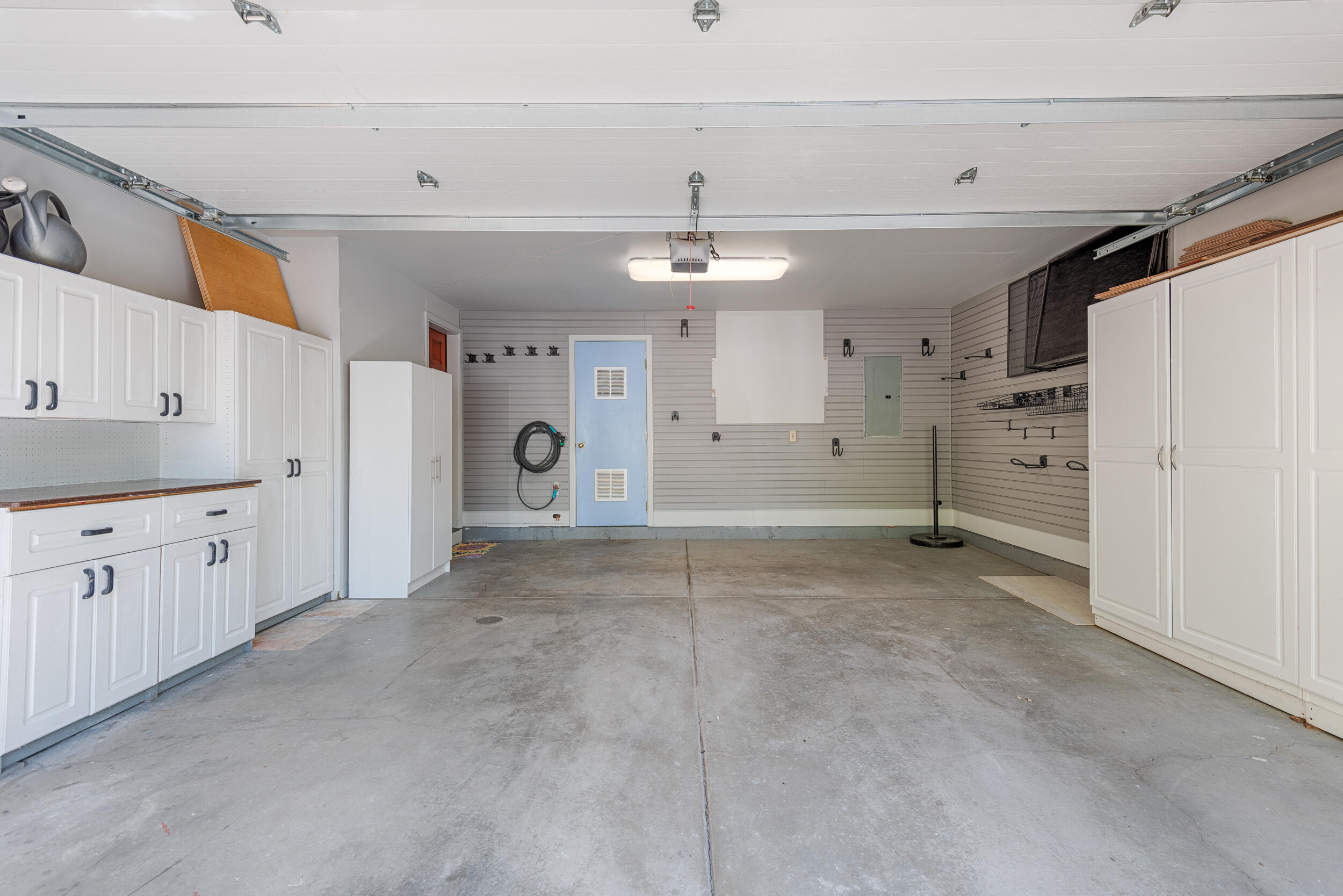 302 Adams Ranch Road, Unit 16 Mountain Village, CO 81435 - Photo 13 of 18 2-Car Garage with Expansive Storage