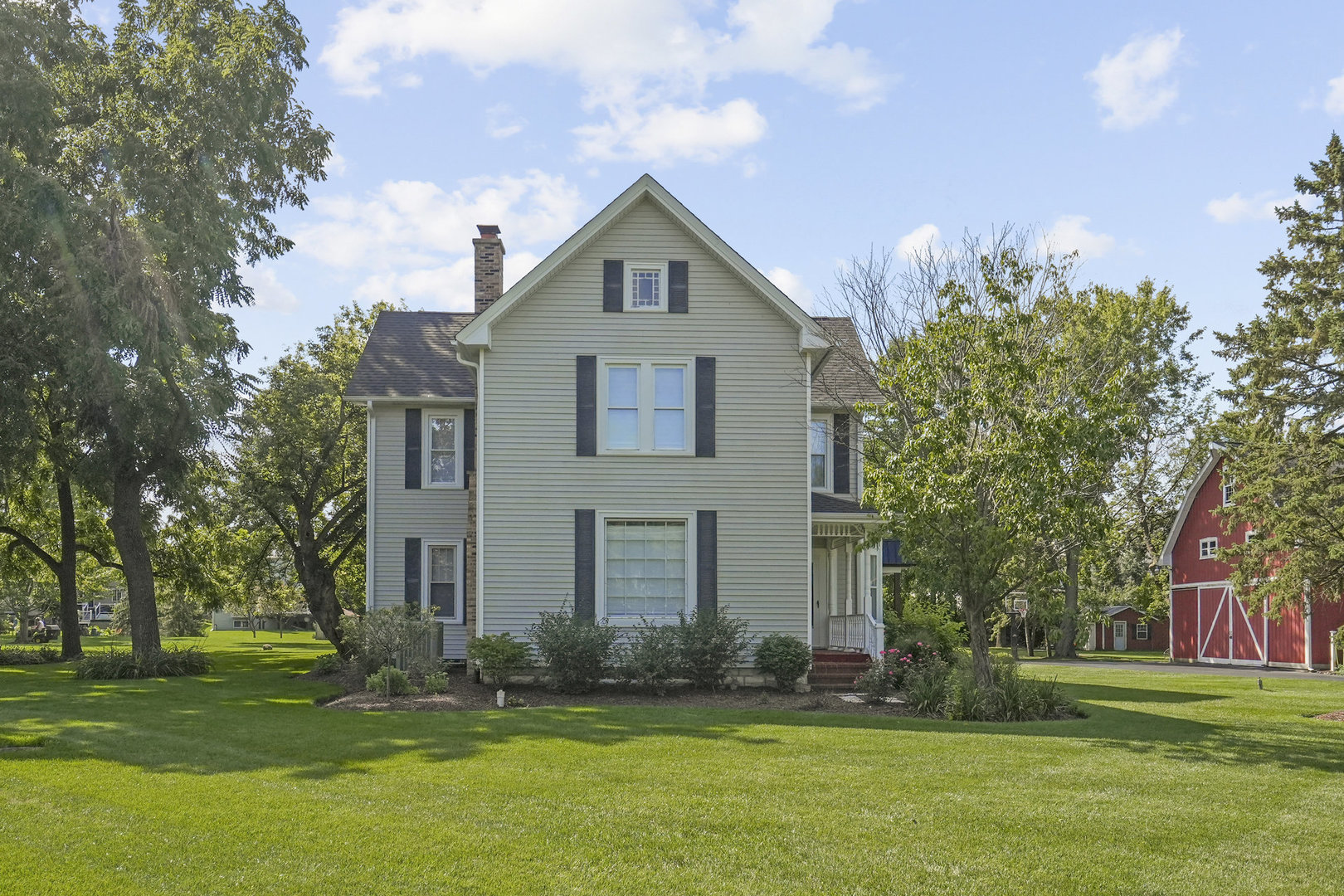 3614 Wolf Road Oswego, IL 60543 - Photo 3 of 56 a front view of a house with a yard