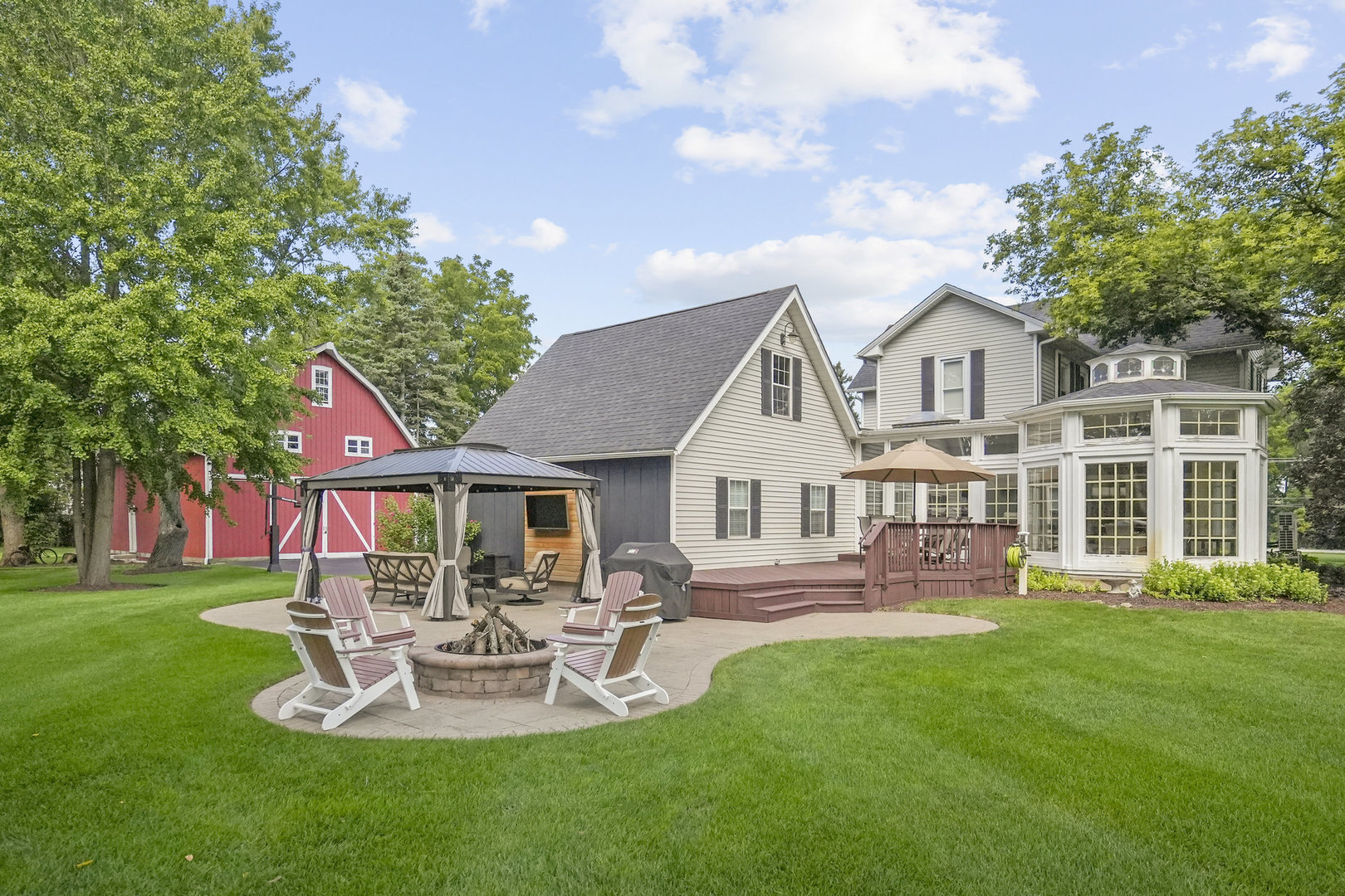 3614 Wolf Road Oswego, IL 60543 - Photo 36 of 56 a front view of house with yard and outdoor seating