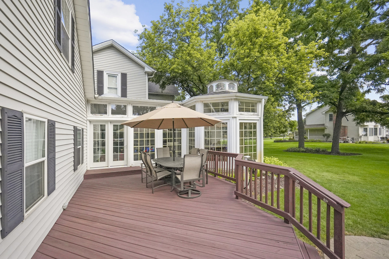 3614 Wolf Road Oswego, IL 60543 - Photo 40 of 56 a view of a house with a deck and backyard