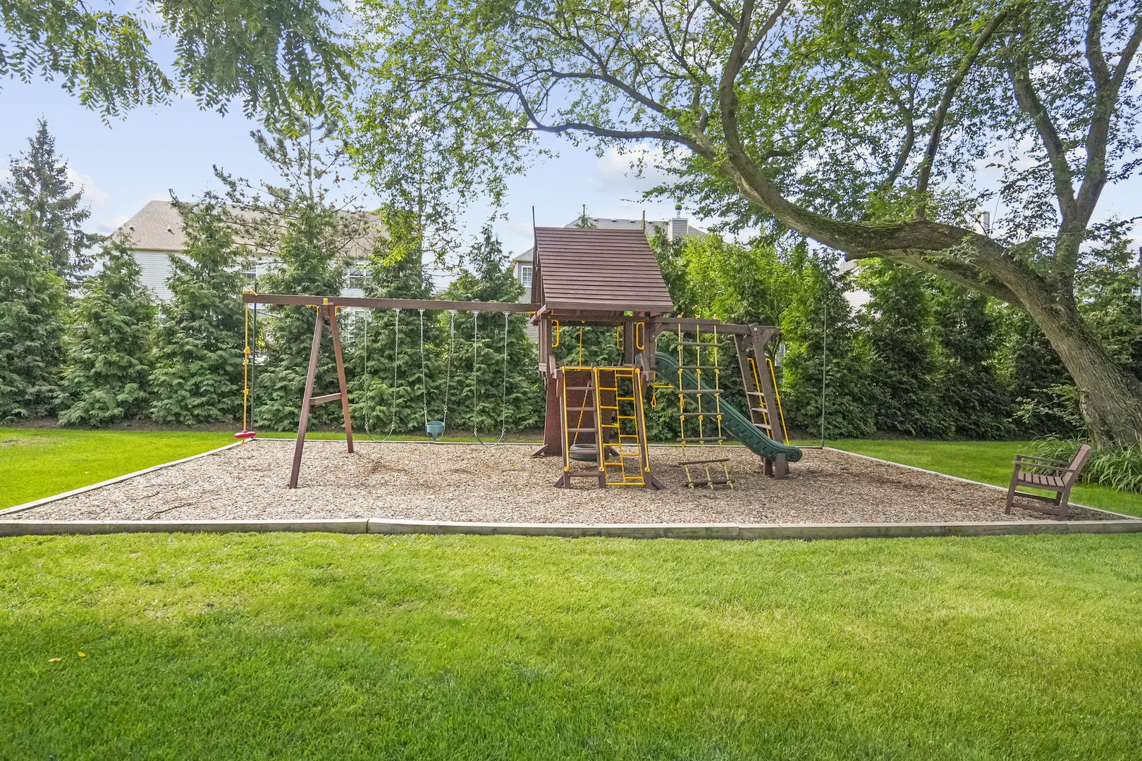 3614 Wolf Road Oswego, IL 60543 - Photo 50 of 56 a view of a park with a slide