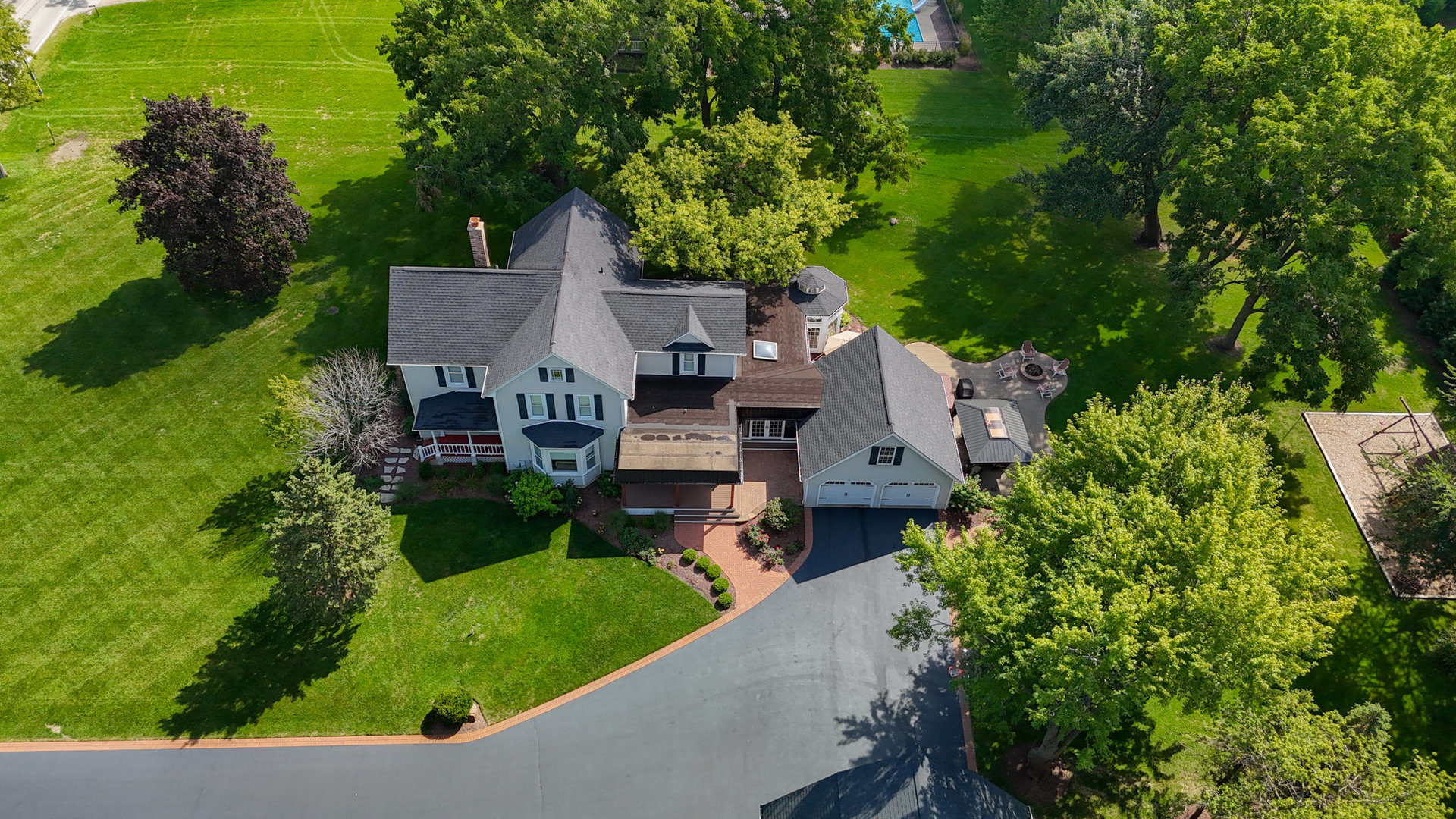 3614 Wolf Road Oswego, IL 60543 - Photo 56 of 56 an aerial view of a house with garden space and street view