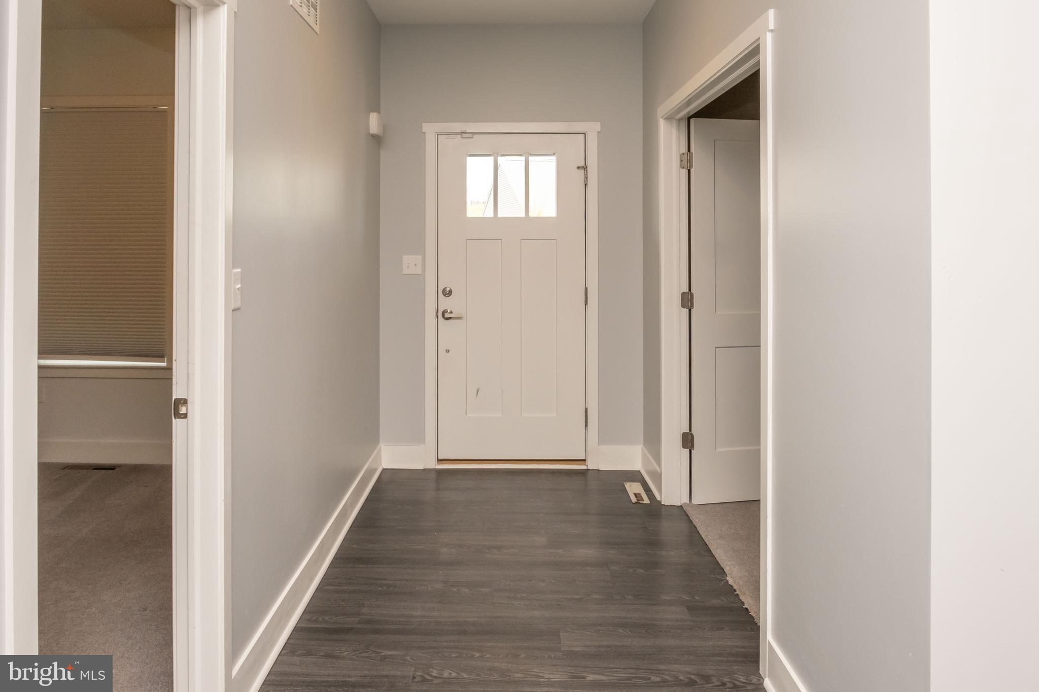 6042 Station Cir Road Harrisburg, PA 17111 - Photo 13 of 71 a view of a hallway with wooden floor