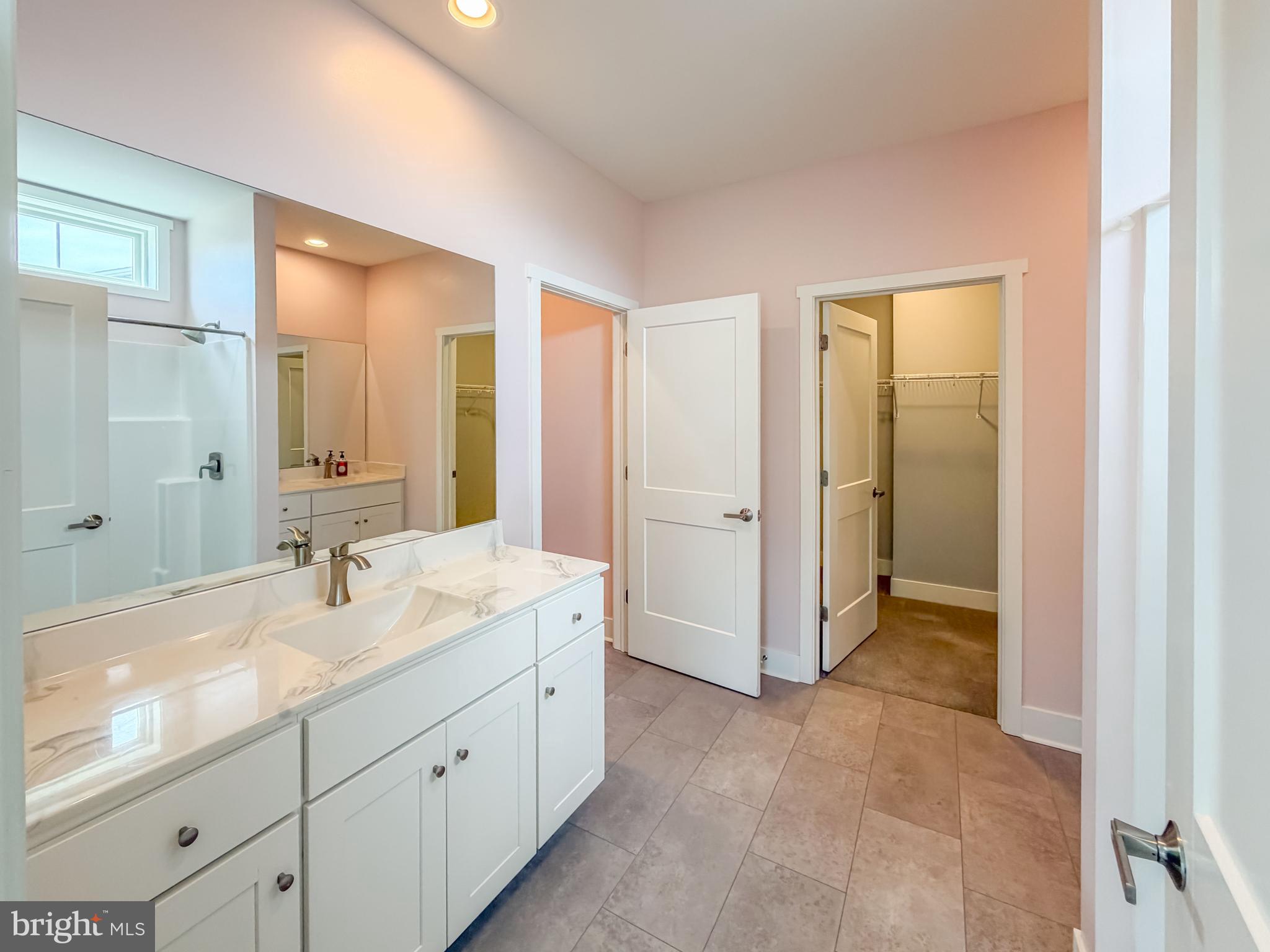 6042 Station Cir Road Harrisburg, PA 17111 - Photo 44 of 71 a spacious bathroom with a sink and a mirror