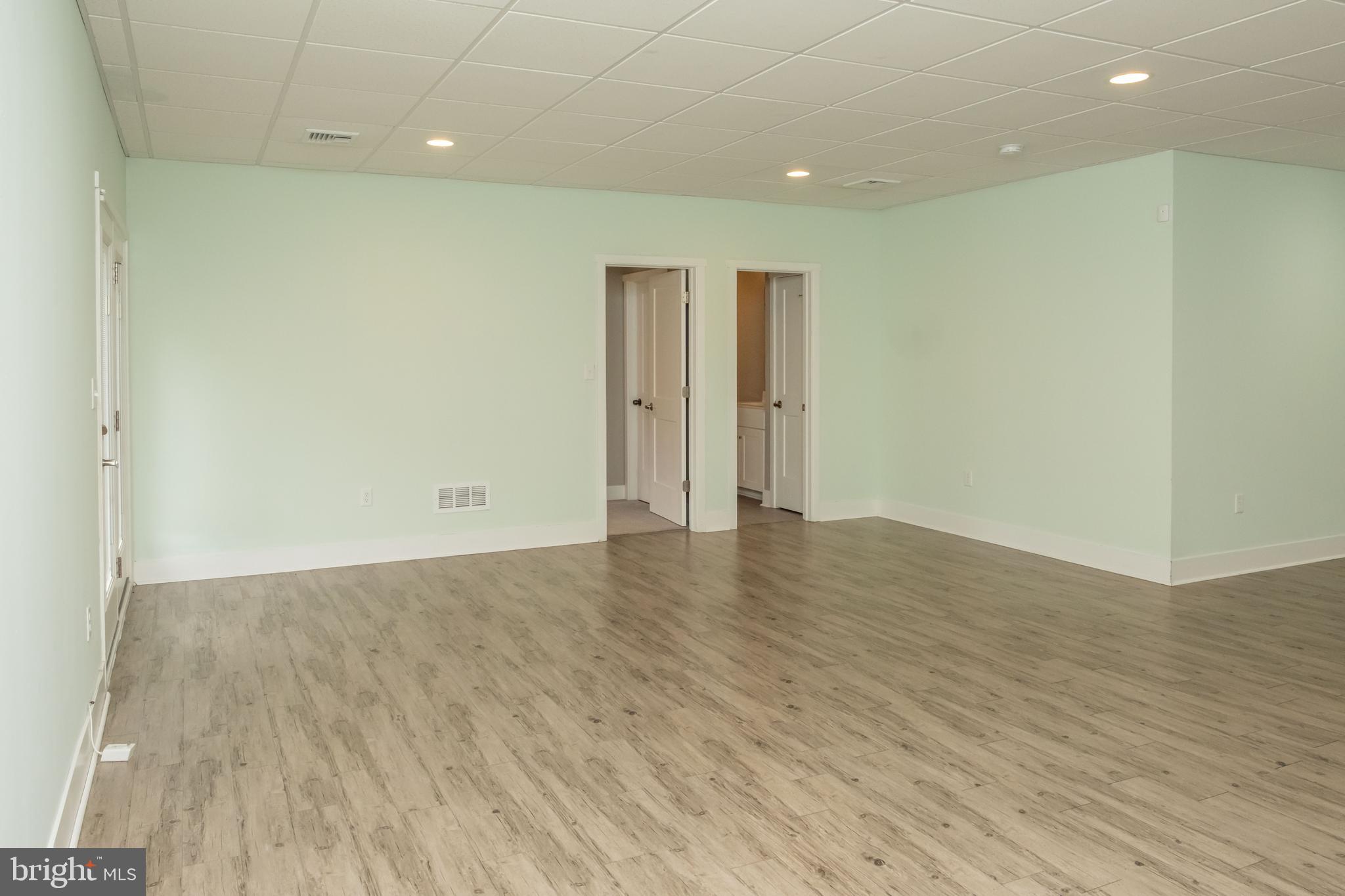6042 Station Cir Road Harrisburg, PA 17111 - Photo 54 of 71 an empty room with wooden floor and natural light
