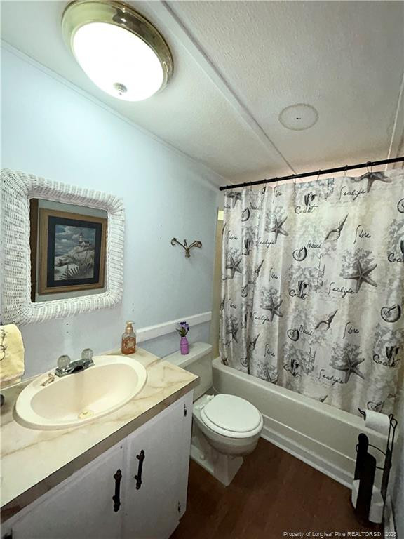 110 Kinton Drive Willow Spring, NC 27592 - Photo 17 of 50 a bathroom with a toilet sink and mirror