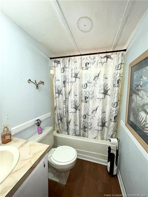 110 Kinton Drive Willow Spring, NC 27592 - Photo 18 of 50 a bathroom with a sink a toilet and a bathtub