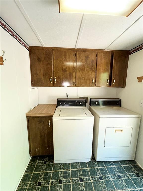 110 Kinton Drive Willow Spring, NC 27592 - Photo 31 of 50 a utility room with dryer and washer