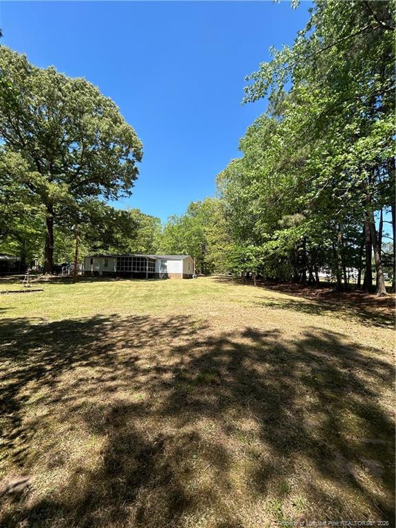 110 Kinton Drive Willow Spring, NC 27592 - Photo 44 of 50 a view of lake view