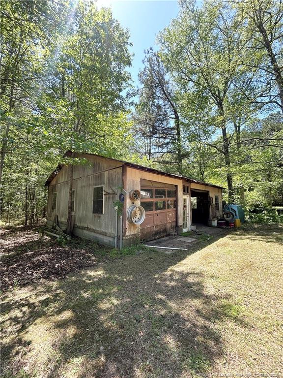 110 Kinton Drive Willow Spring, NC 27592 - Photo 45 of 50 a view of a house with a yard