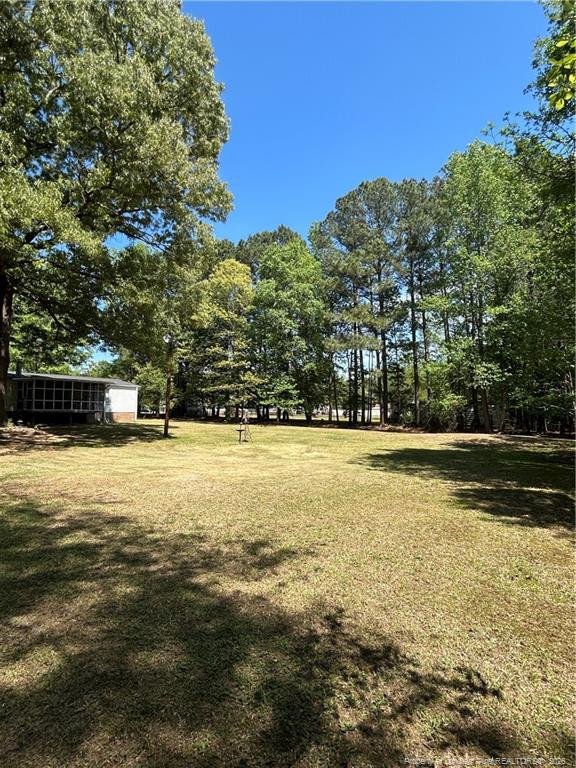 110 Kinton Drive Willow Spring, NC 27592 - Photo 49 of 50 a view of a swimming pool with an outdoor space