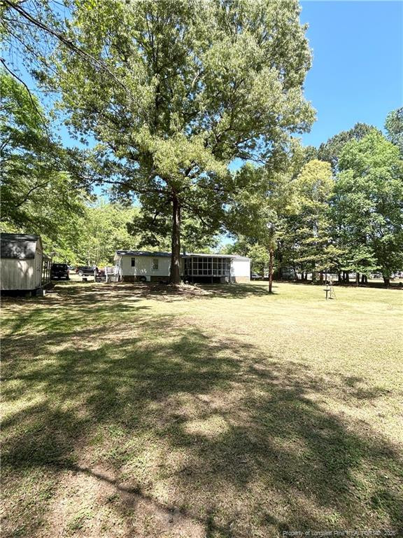 110 Kinton Drive Willow Spring, NC 27592 - Photo 50 of 50 a view of a yard with large trees