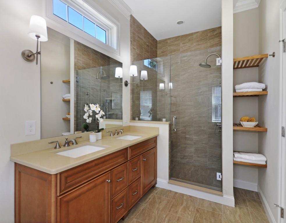 30 Nancy Road Concord, MA 01742 - Photo 15 of 26 a bathroom with a sink and a mirror