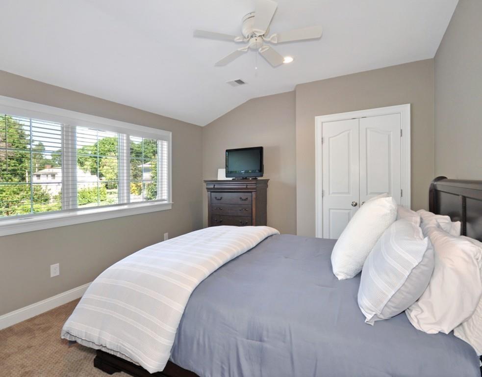 30 Nancy Road Concord, MA 01742 - Photo 16 of 26 a bedroom with a bed and a window