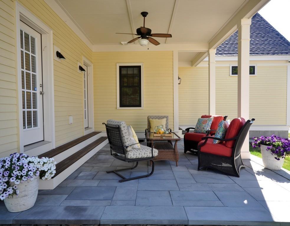 30 Nancy Road Concord, MA 01742 - Photo 23 of 26 a living room with furniture flowers and a window
