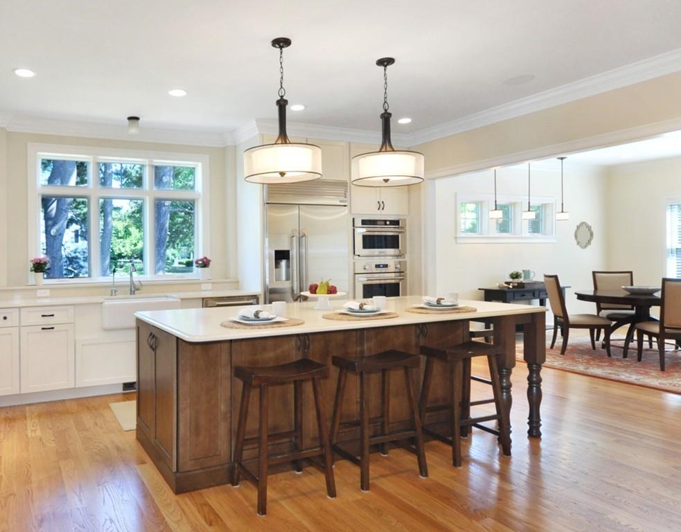 30 Nancy Road Concord, MA 01742 - Photo 5 of 26 a kitchen with center island and sink
