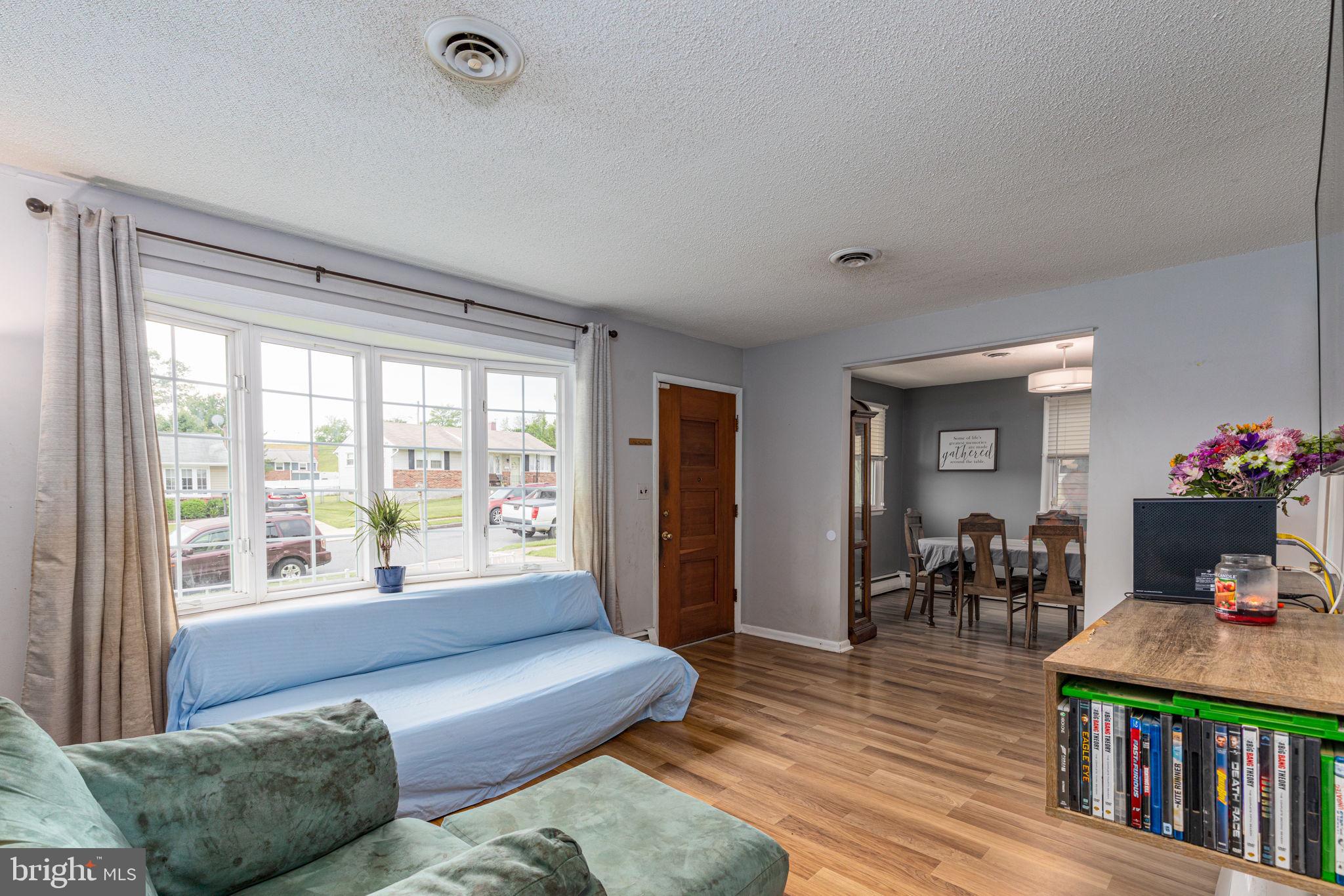 2710 Burridge Road Baltimore, MD 21234 - Photo 5 of 25 Family room with hardwood floors
