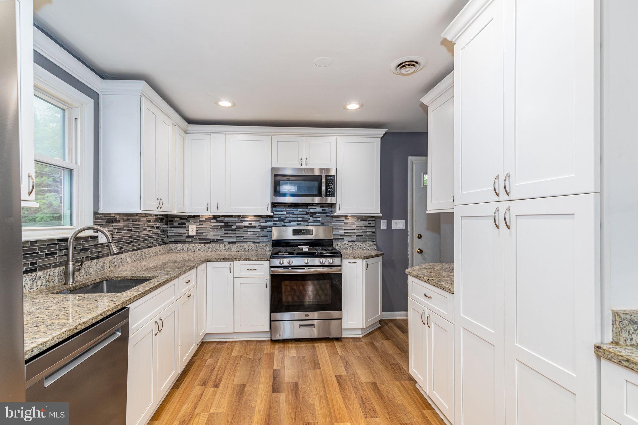 2710 Burridge Road Baltimore, MD 21234 - Photo 9 of 25 Up dated kitchen with stainless steel appliances